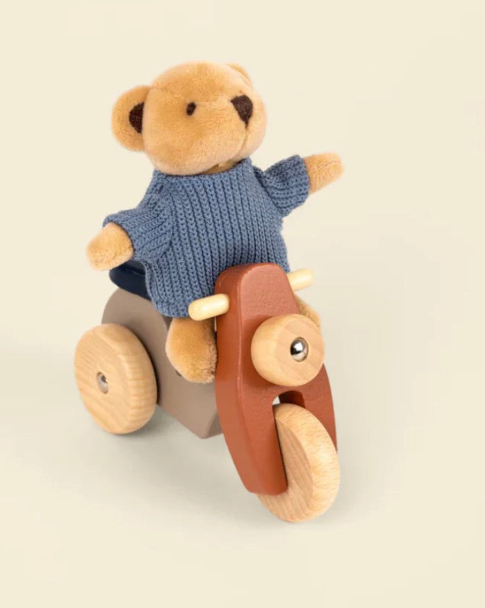 Alexis The Bear on a vespa