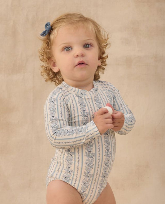 DELPHINE RASHGUARD ONE-PIECE BLUE FLORAL