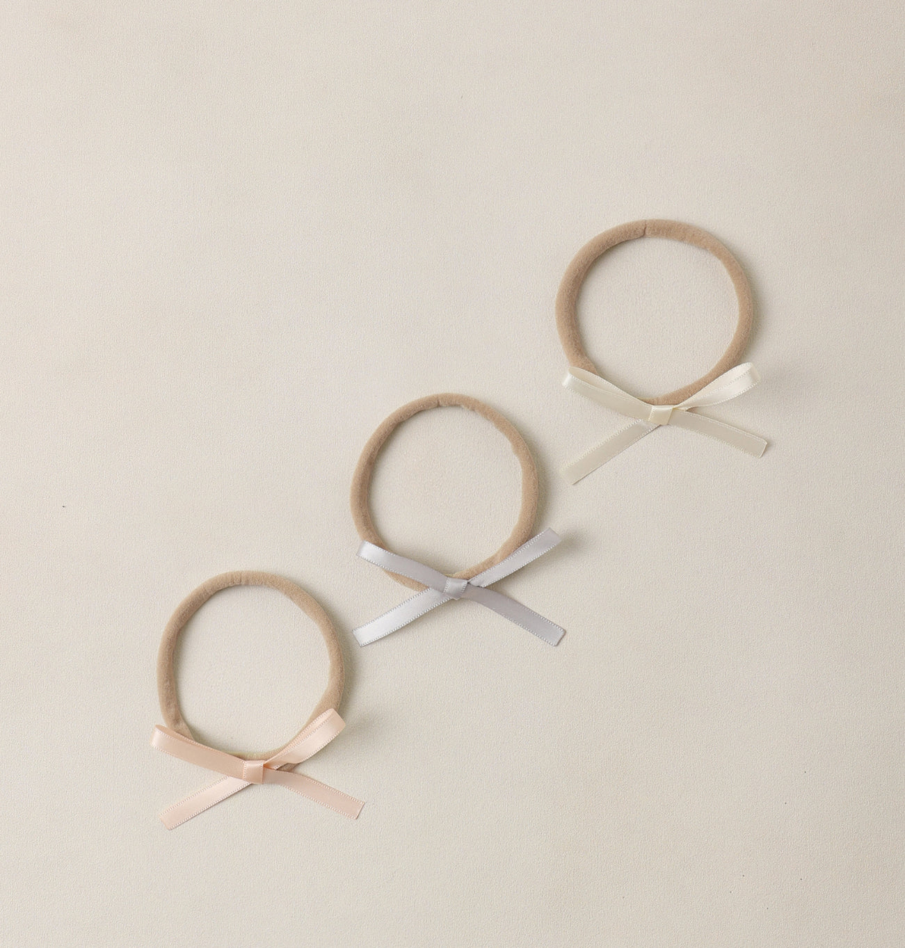 BABY BOW HEADBANDS MIST/PEARL/IVORY