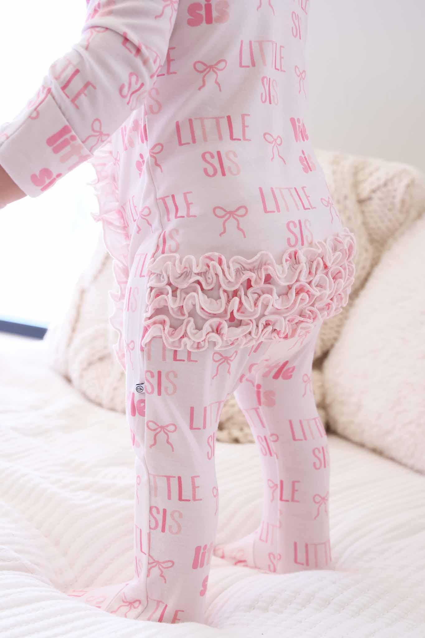 Little Sis Ruffle Zipper Footie