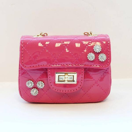 Cross-body purse with diamond embellishment.